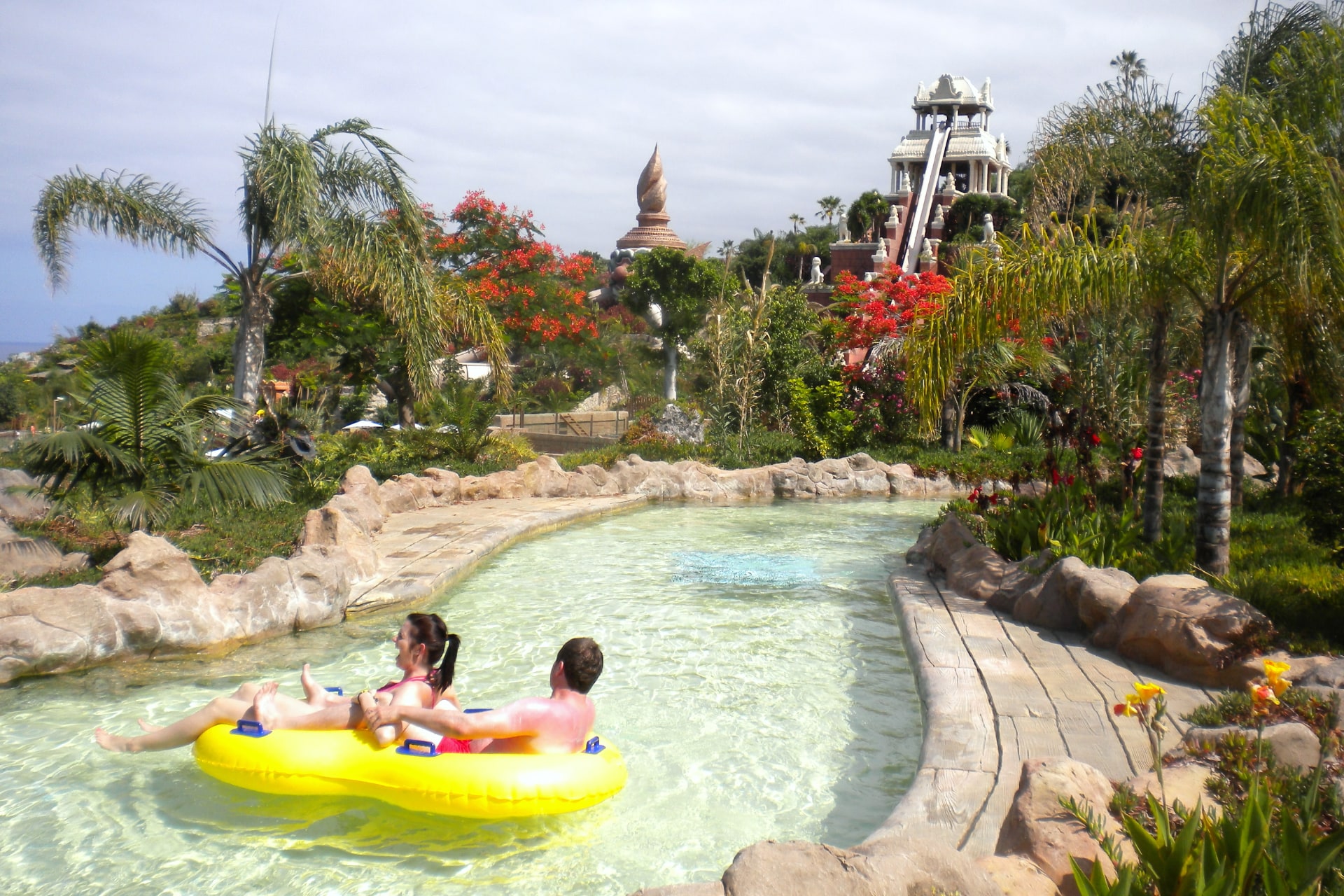 The Tower of Power overlooking the lazy river at Siam Park, Tenerife, adding excitement to the water ride experience